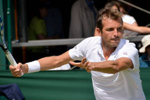 Triumph On Tennis Court: Julien Benneteau Celebrating A Victory Wallpaper