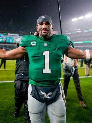 Triumphant Football Player Celebration Wallpaper