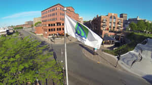 Trois Rivieres Cityscapewith Flag Wallpaper