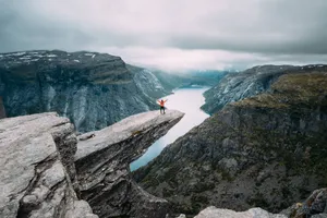 Trolltunga With Dark Grey Rocks Wallpaper