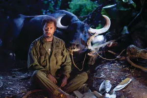 Tropic Thunder Character With Water Buffalo Wallpaper