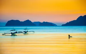 Tropical Sunset Fishing Boats Silhouette Wallpaper