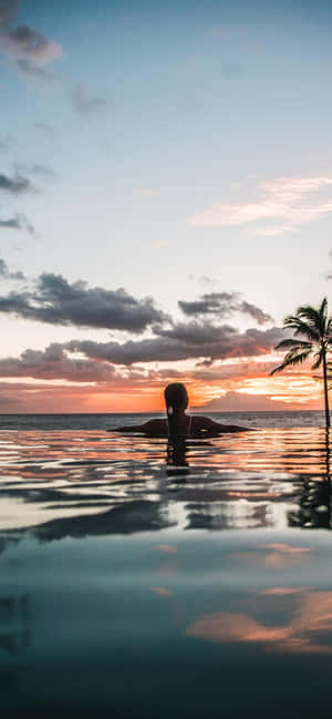 Tropical_ Sunset_ Swim Wallpaper