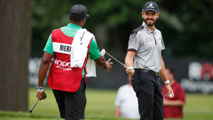 Troy Merritt Smiling At A Caddie Wallpaper