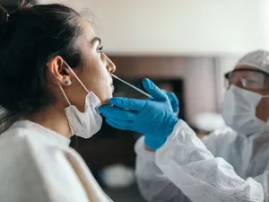 Tumultuous Covid 19 Testing Wallpaper