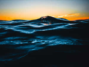 Tumultuous Dark Blue Ocean Wallpaper