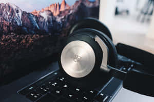 Tune Into Your Laptop With These Stylish Headphones Wallpaper