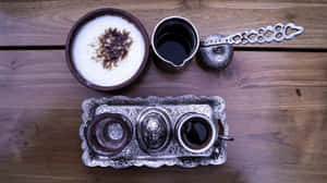 Turkish Coffeeand Rice Pudding Setup Wallpaper