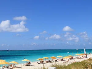 Turks And Caicos Blue Ocean Yellow Umbrellas Wallpaper