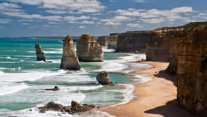 Twelve Apostles In Victoria Australia During Cloudy Day Wallpaper