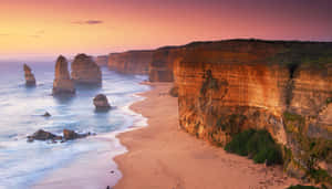 Twelve Apostles In Victoria Australia During Nightfall Wallpaper