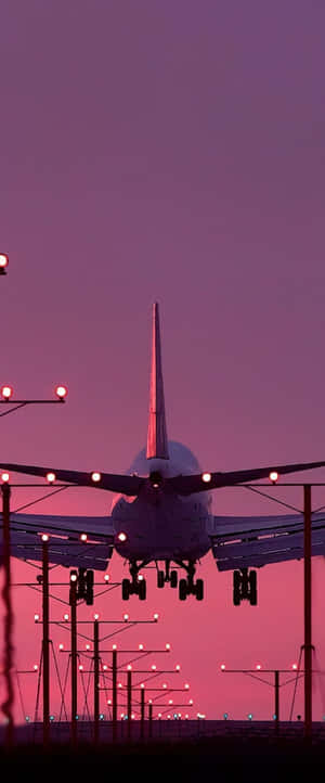 Twilight Airplane Landing Wallpaper