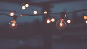 Twilight Glow String Lights Wallpaper