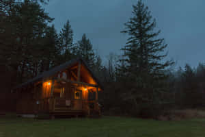 Twilight Log Cabin Retreat Wallpaper