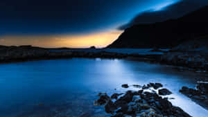 Twilight Serenityat Coastal Lake Wallpaper