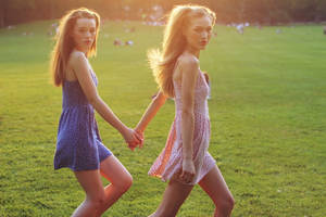 Twin Sister Bonding Grass Wallpaper