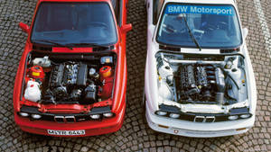 Two Bmw M Car Parked Wallpaper