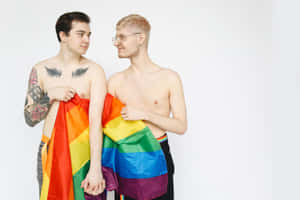 Two Gay Boys Holding Pride Flag Wallpaper