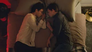 Two Gay Boys Lying In Bed Wallpaper