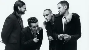 Two Guys Laughing And Having Fun Wallpaper