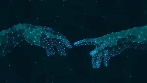 Two Hands Reaching Out To Each Other On A Black Background Wallpaper