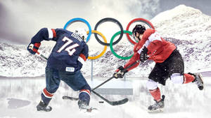 Two Hockey Players Are Playing In The Snow Wallpaper