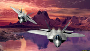 Two Jets Flying Over A Lake Wallpaper