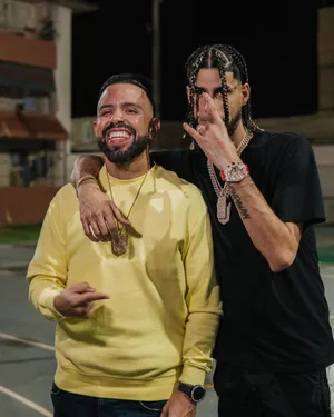 Two Men Nighttime Casual Encounter Wallpaper