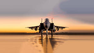 Two Military Jets Soaring Through Clouds Wallpaper