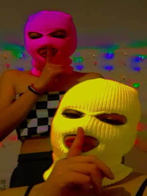 Two Neon Knitted Ski Mask Girl Wallpaper