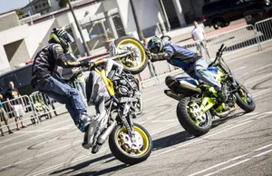 Two People On Motorcycles Wallpaper