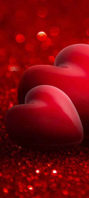 Two Red Hearts On A Red Background Wallpaper