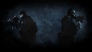 Two Silhouettes Of Soldiers Holding Guns Wallpaper