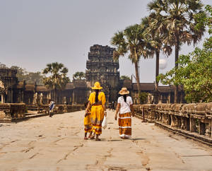 Two Women In Cambodia Temple Wallpaper