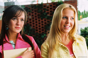 Two Women Outdoor Scene Wallpaper