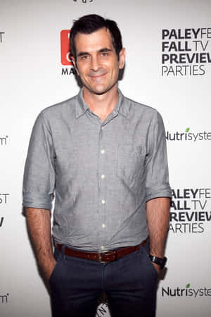 Ty Burrell Posing For A Photoshoot Wallpaper