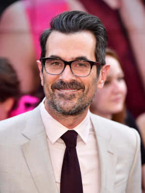 Ty Burrell Smiling At An Event Wallpaper