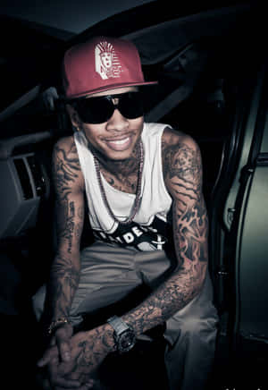 Tyga Looks Cool And Confident Wallpaper