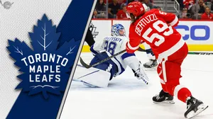 Tyler Bertuzzi In Action During A Hockey Game Wallpaper