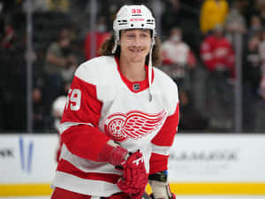 Tyler Bertuzzi In Action During A Hockey Game Wallpaper