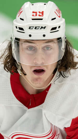 Tyler Bertuzzi In Action During A Hockey Game Wallpaper