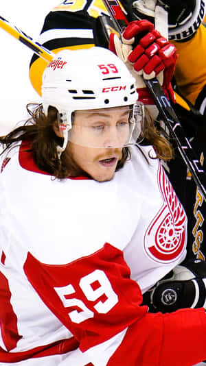 Tyler Bertuzzi In Action With The Detroit Red Wings Wallpaper