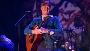 Tyler Childers Live Performancewith Guitar Wallpaper