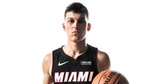 Tyler Herro Of The Miami Heat Goes For The Dunk Wallpaper