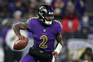 Tyler Huntley Baltimore Ravens Quarterback Action Wallpaper