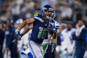 Tyler Lockett Football Player Seattle Seahawks Team Wallpaper