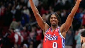 Tyrese Maxey Celebrating Victory Philadelphia76ers Wallpaper