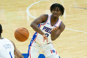 Tyrese Maxey Philadelphia76ers Basketball Action Wallpaper