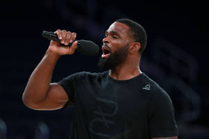 Tyron Woodley Holding Mic Wallpaper