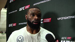 Tyron Woodley In White Shirt Wallpaper